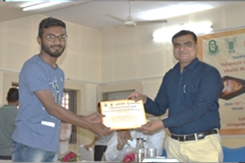 Certificate distribution by Dr. D. T. Fefar, Asst. Prof., COVSAH, JAU